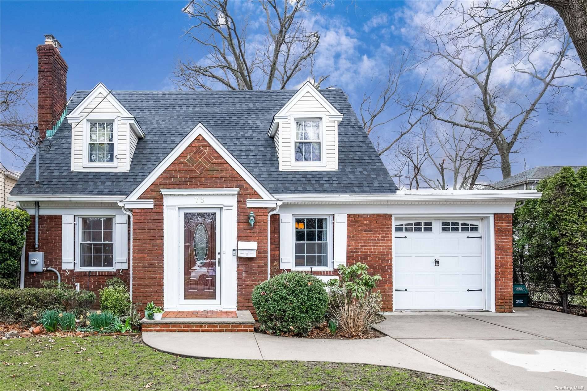 Welcome Home !.... To this Gorgeous Expanded Cape nestled in the Westwood section of Malverne.