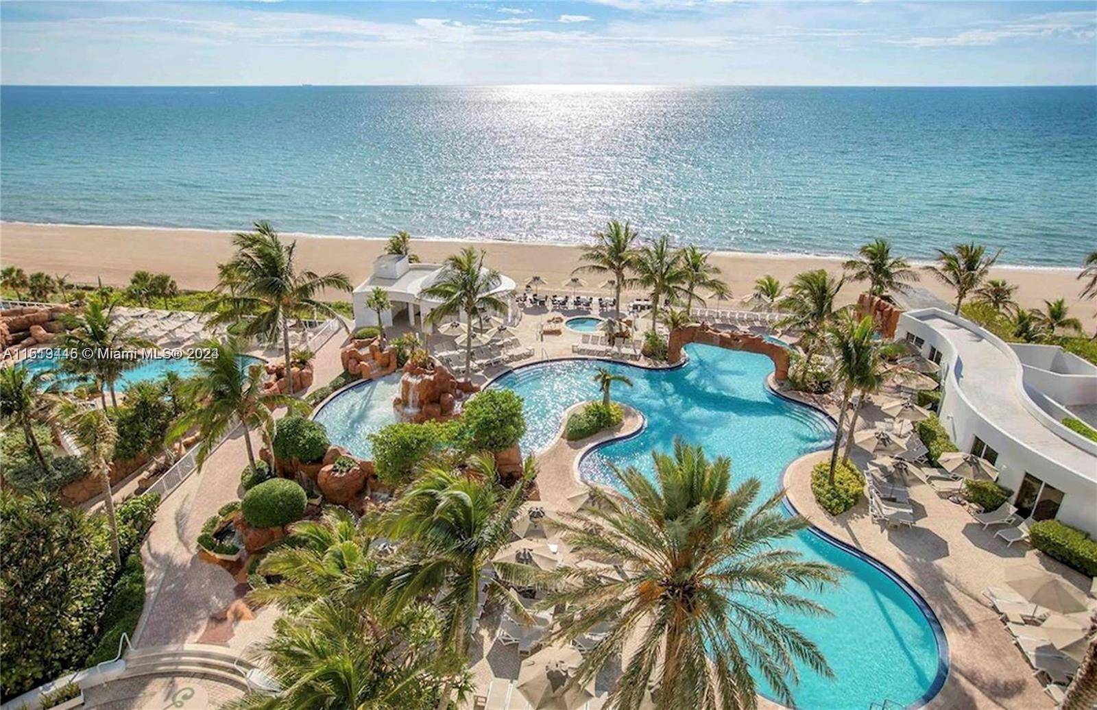 Discover the perfect blend of luxury and convenience in this waterfront condo at the prestigious Trump International Sonesta Beach Resort.