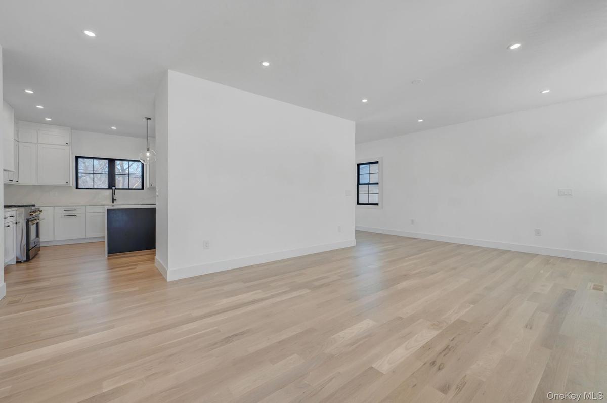 Bright and welcoming entry with clean architectural lines and natural light that immediately sets the tone of the home.