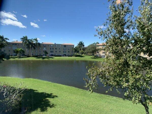 Beautiful well maintained lakefront condo located in the desirable Coral Lakes community which features an active adult lifestyle.