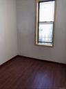 Unfurnished room with baseboards and dark wood finished floors