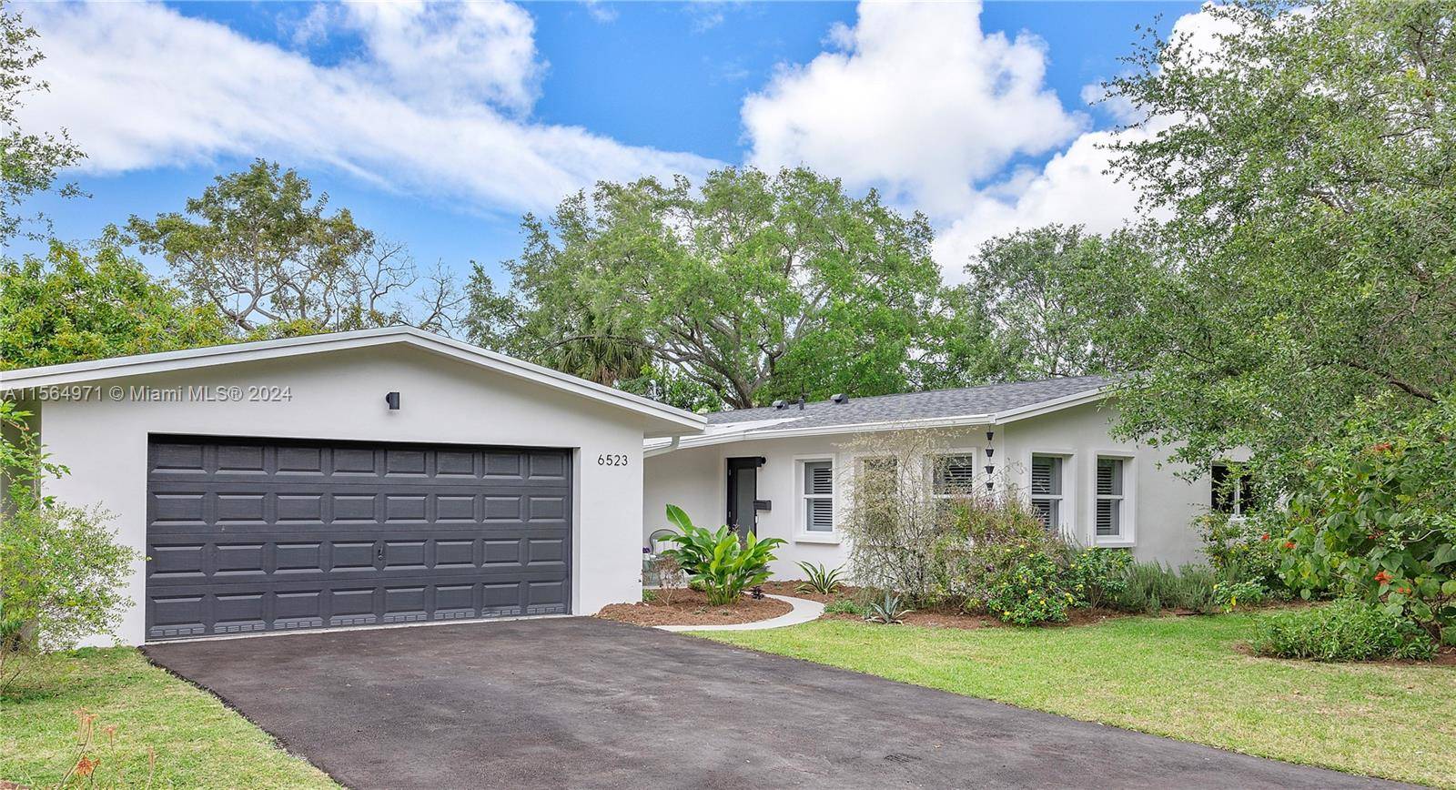 Renovated 3 bedroom, 2 bathroom family home situated on a prime corner lot in South Miami.