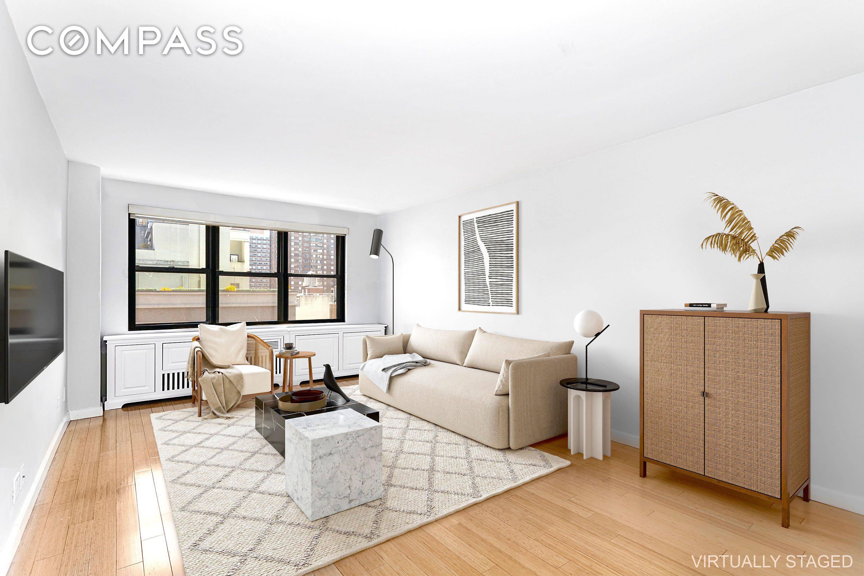 upon entry to unit 14F, you are immediately greeted by an abundance of natural sunlight pouring through the easterly facing windows with unobstructed city views.