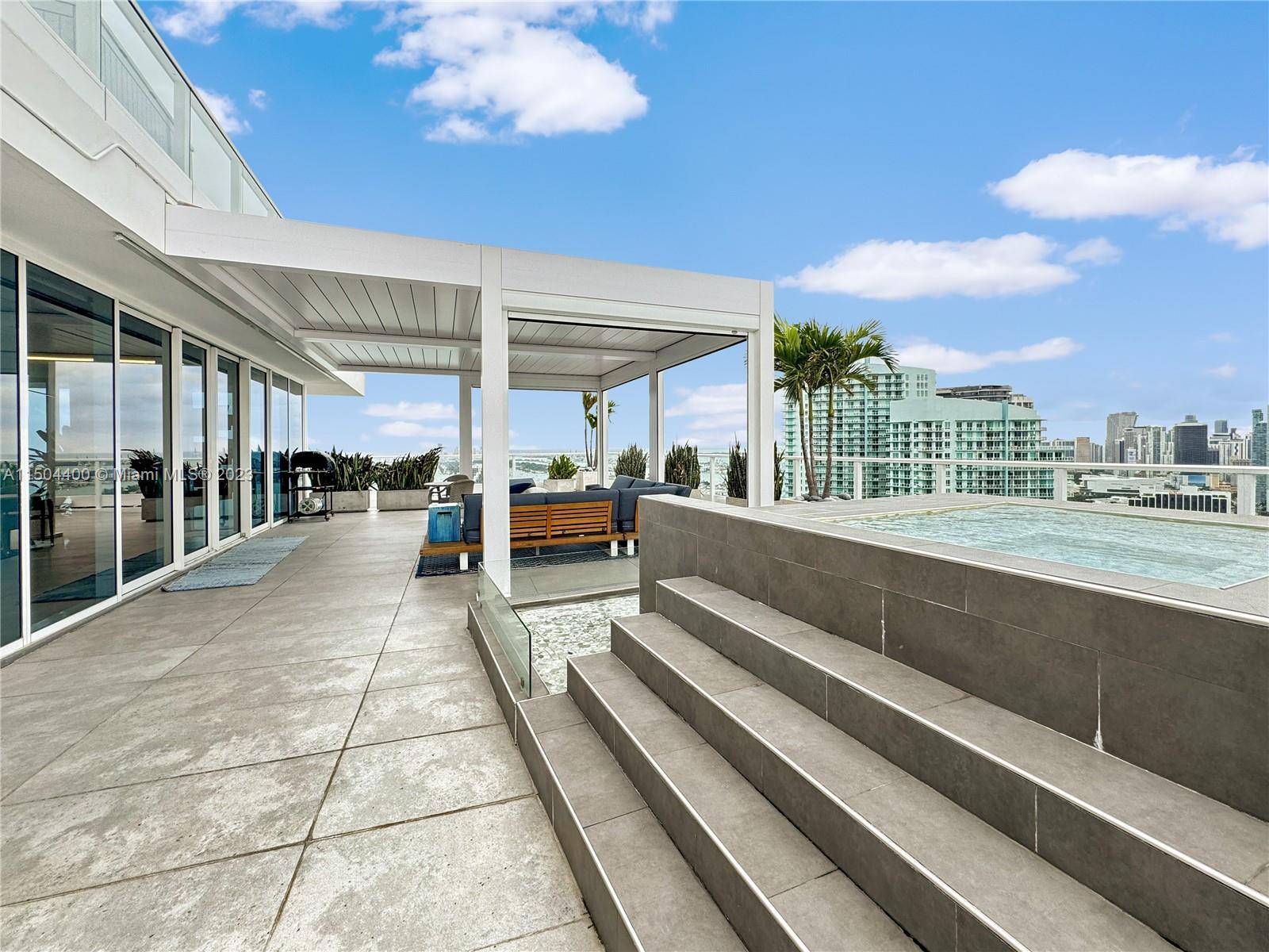 Live in the best renovated rooftop penthouse currently on the market in Edgewater Miami.