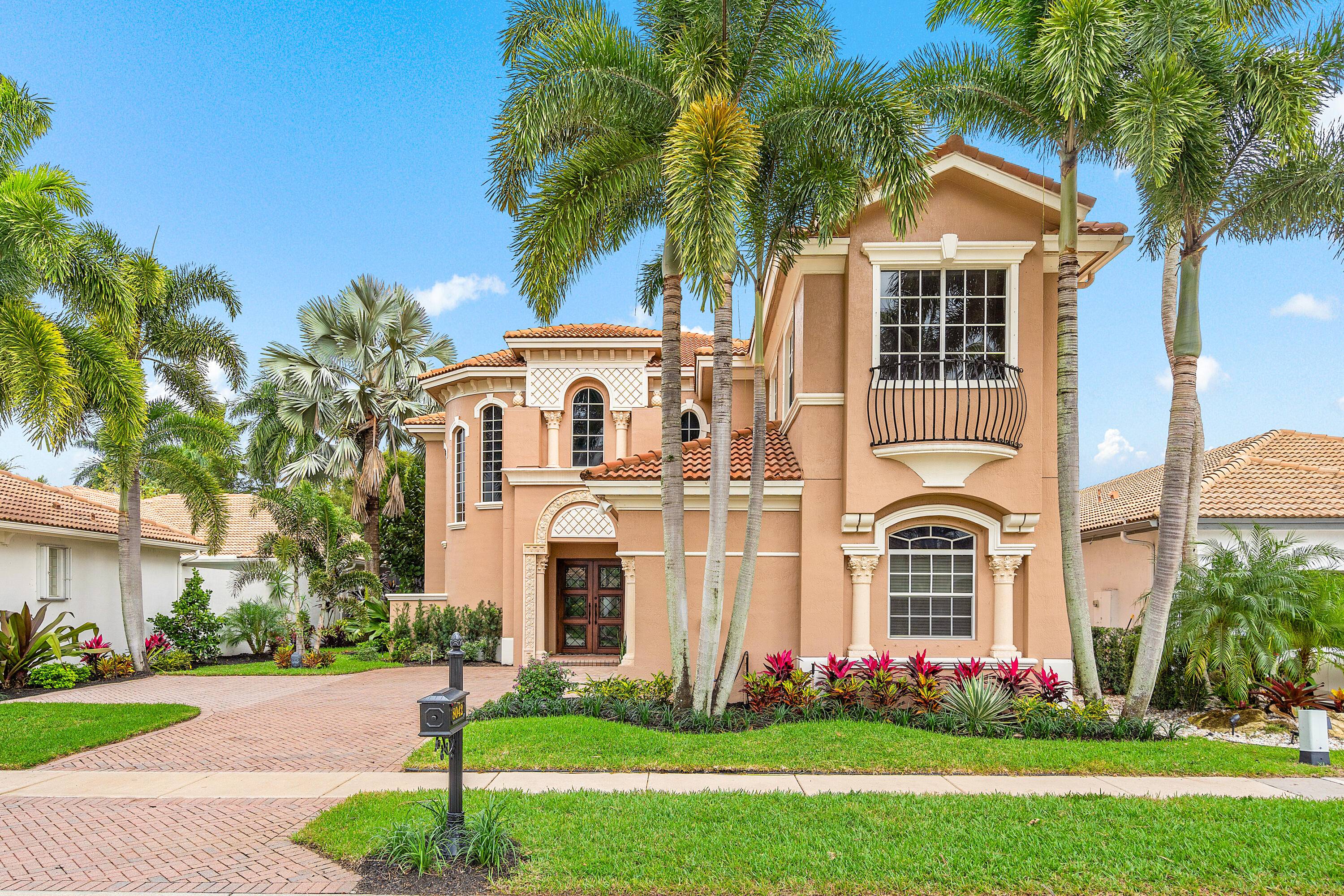 Stunning 2 story, 4 bedroom, 5 bath home in Mizner Country Club.