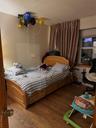 Bedroom with wood finished floors