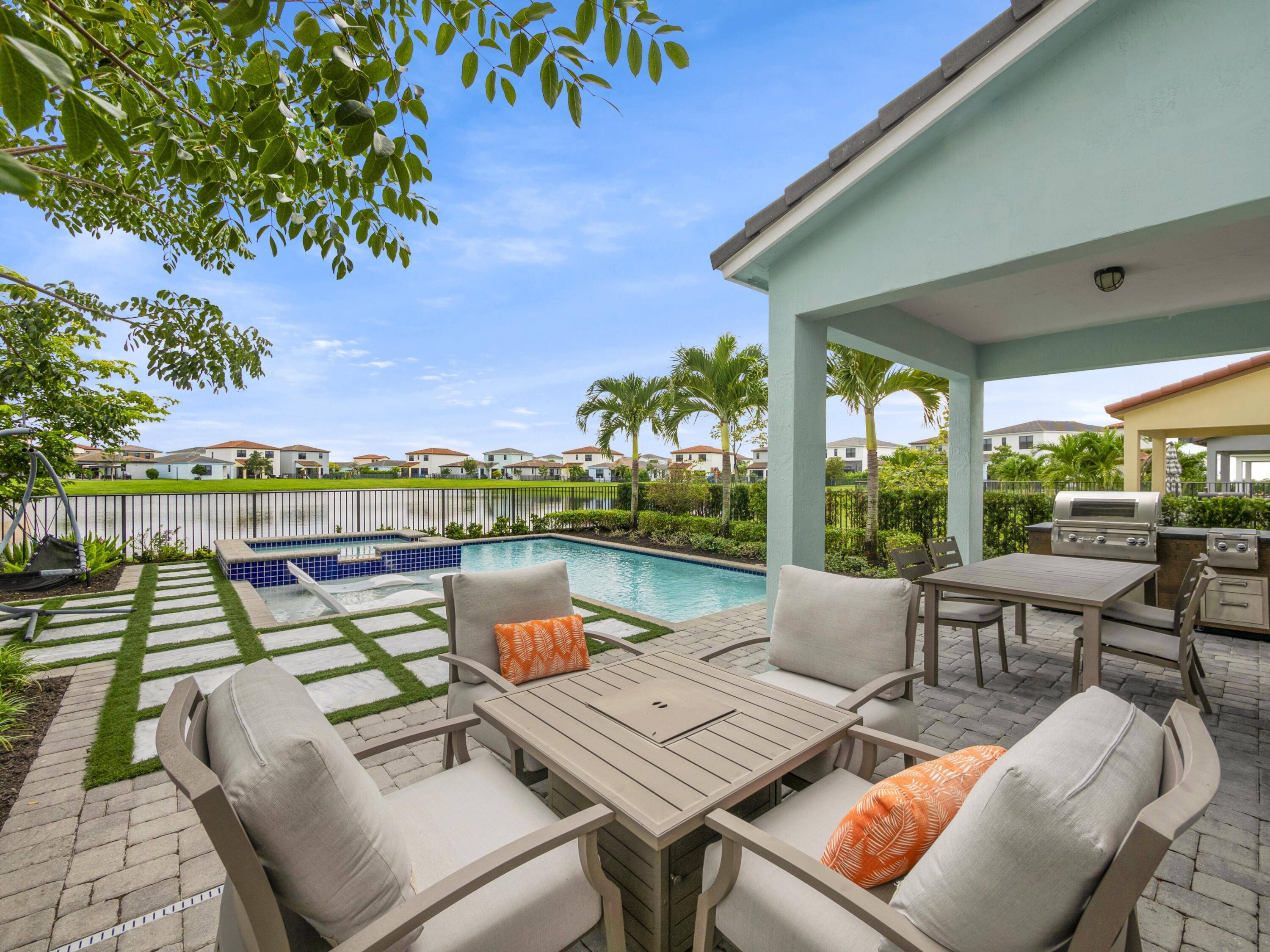 Explore the allure of this impeccably furnished waterfront Sand Dollar 4 pool home, once a prestigious Builders Model, situated in the sought after Sky Cove enclave of Westlake.