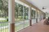 Porch wraps around the whole house.