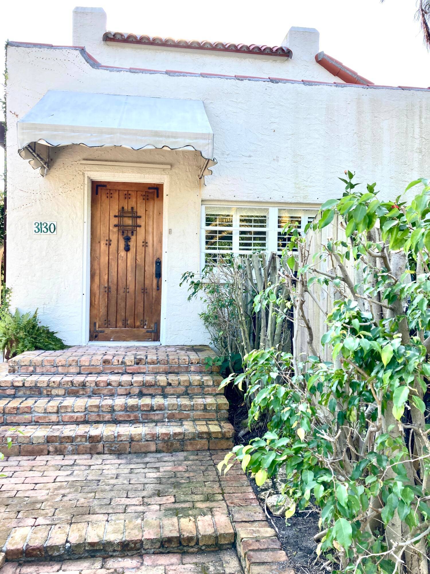 Nestled in the Historic District of WPB this lovingly restored 3 bedroom 2.