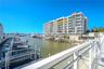 Marina Bay 880 offers breathtaking waterfront views, showcased through expansive floor-to-ceiling windows and sleek glass railings that ensure an unin