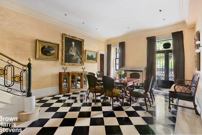 Situated in one of Fifth Avenue's most sought after pre war cooperatives, this impressive maisonette apartment offers very large scale rooms with wonderful Georgian architectural detail, which includes a mahogany ...
