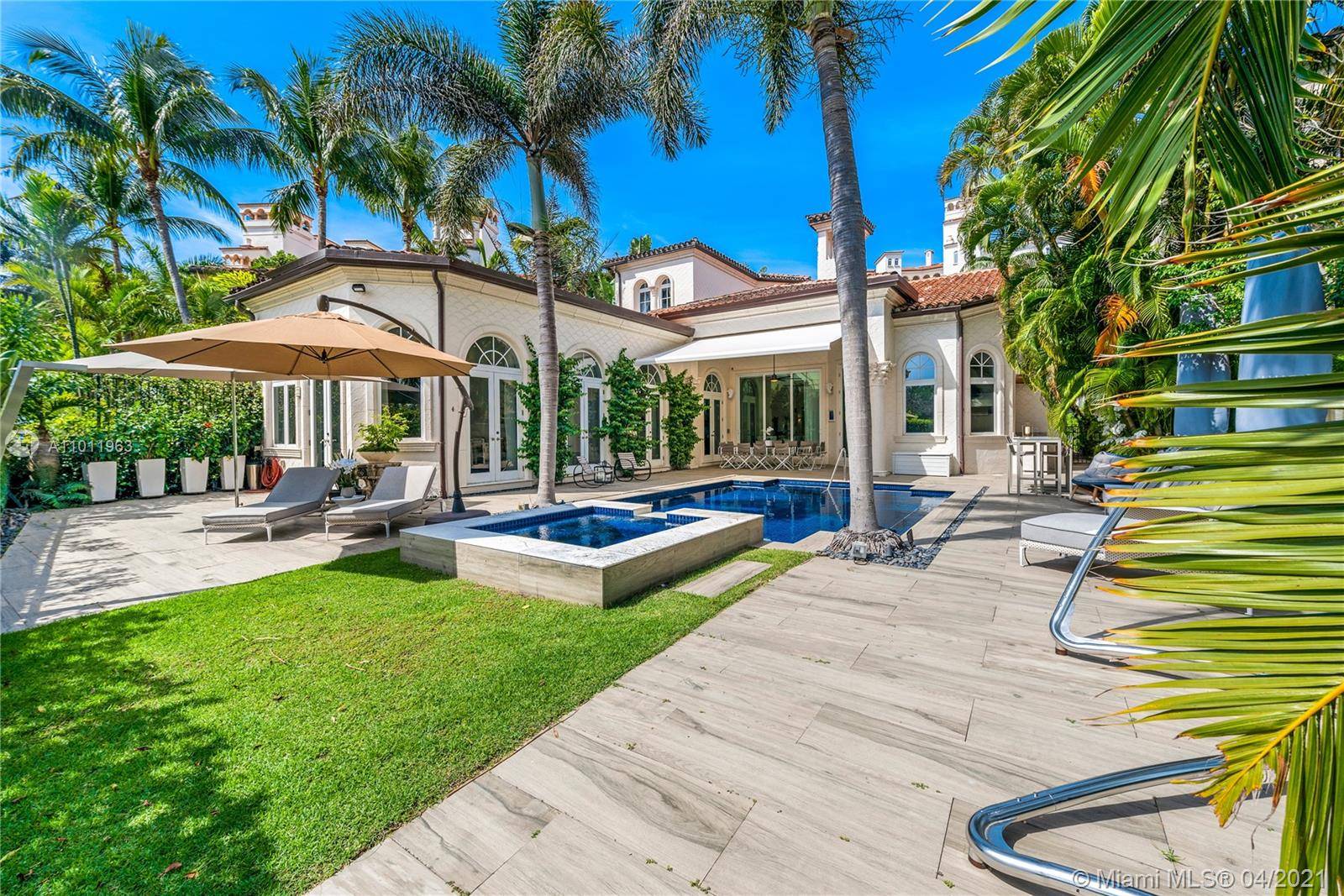 This one of a kind two story fully renovated two story gem at Valencia Estate greets you with high ceilings, private pool and expansive terraces overlooking the Fisher Island golf ...