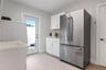 Laundry room with utility sink and folding area