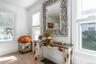 Detailed view of crown molding and wood finished floors