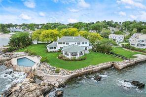 Stunning gated Waterfront Estate w 240 feet of ocean frontage awaits you !