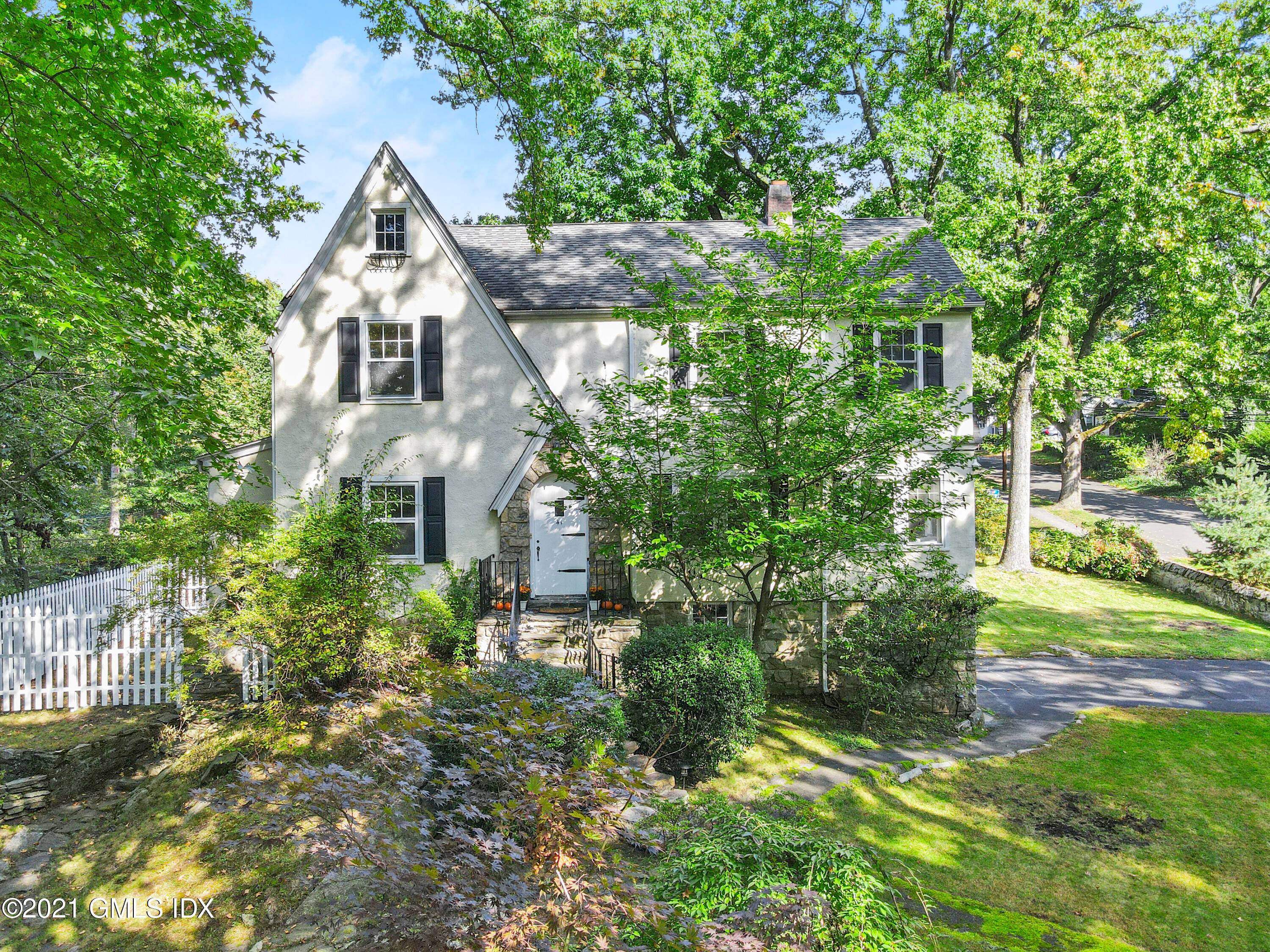 Enjoy living in a stately tudor style home which has been beautifully updated, while having the ease of everything close by train station, Cos Cob Park, Loughlin Park, and the ...