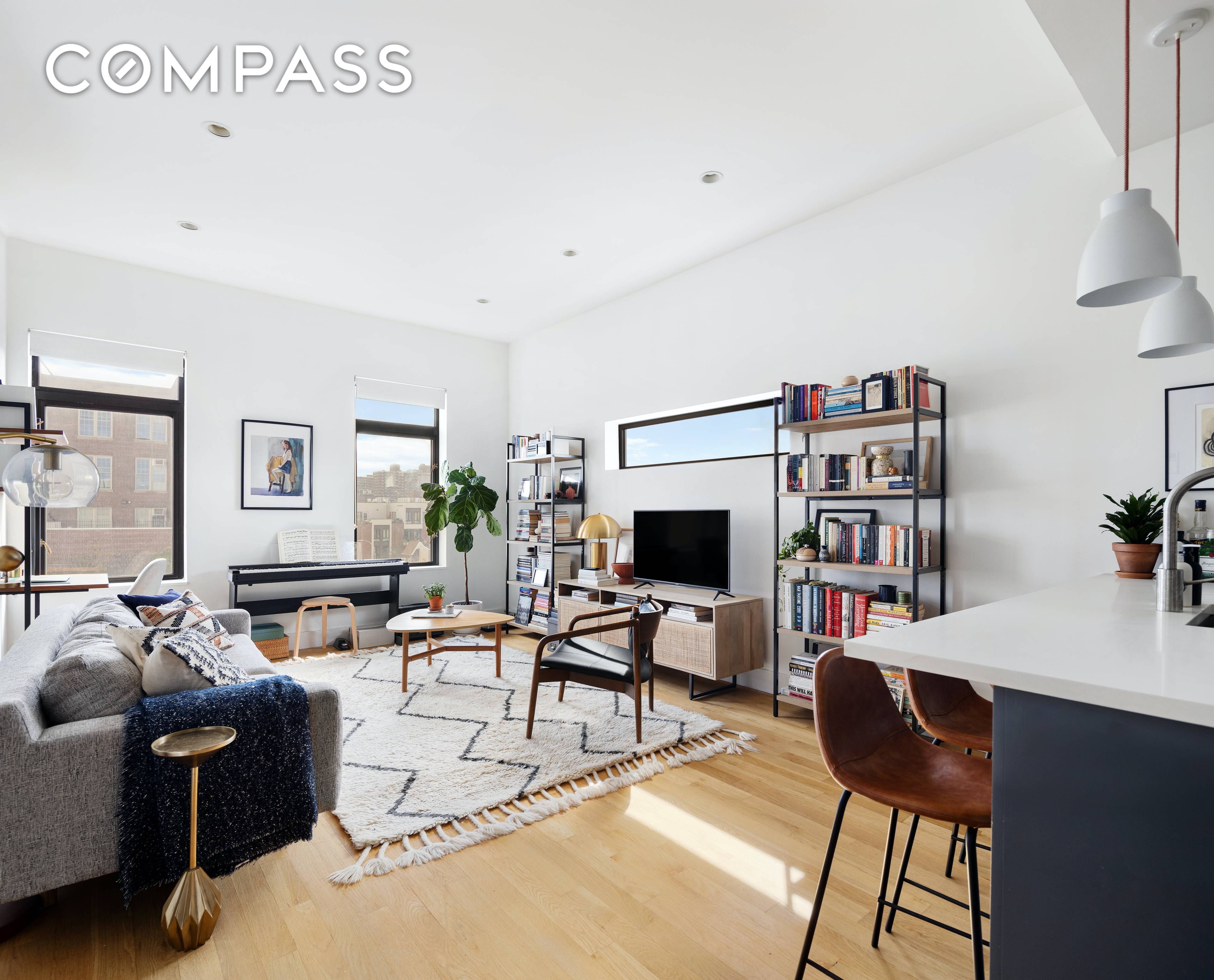 Welcome to this beautiful sun drenched home, nestled in a boutique, well run condominium in the heart of Williamsburg !