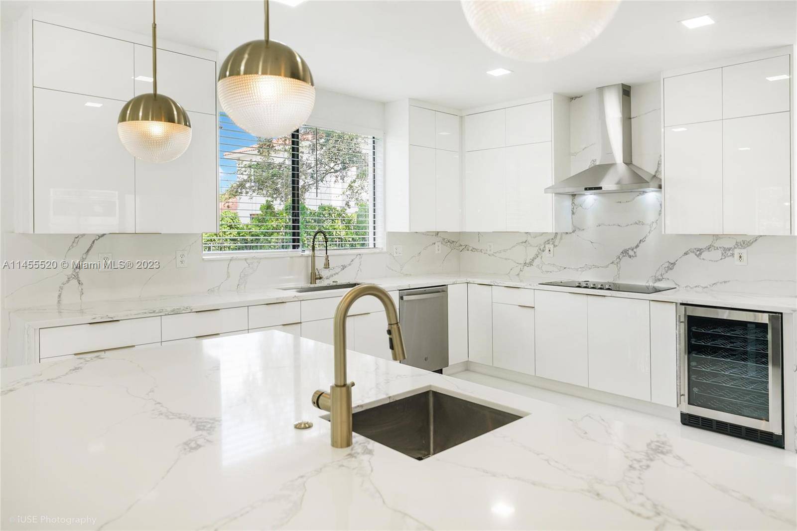 Introducing this spectacular, completely renovated home in the prestigious Cutler Cay community.
