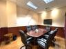 Home office featuring wainscoting, a paneled ceiling, and wood walls