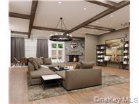 RENDERING - Living room finished concept with actual stone fireplace feature.