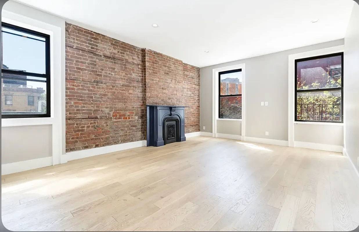 Gorgeous, newly renovated TRUE 3BR 2BA with in unit washer and dryer, hardwood floors and exposed brick.