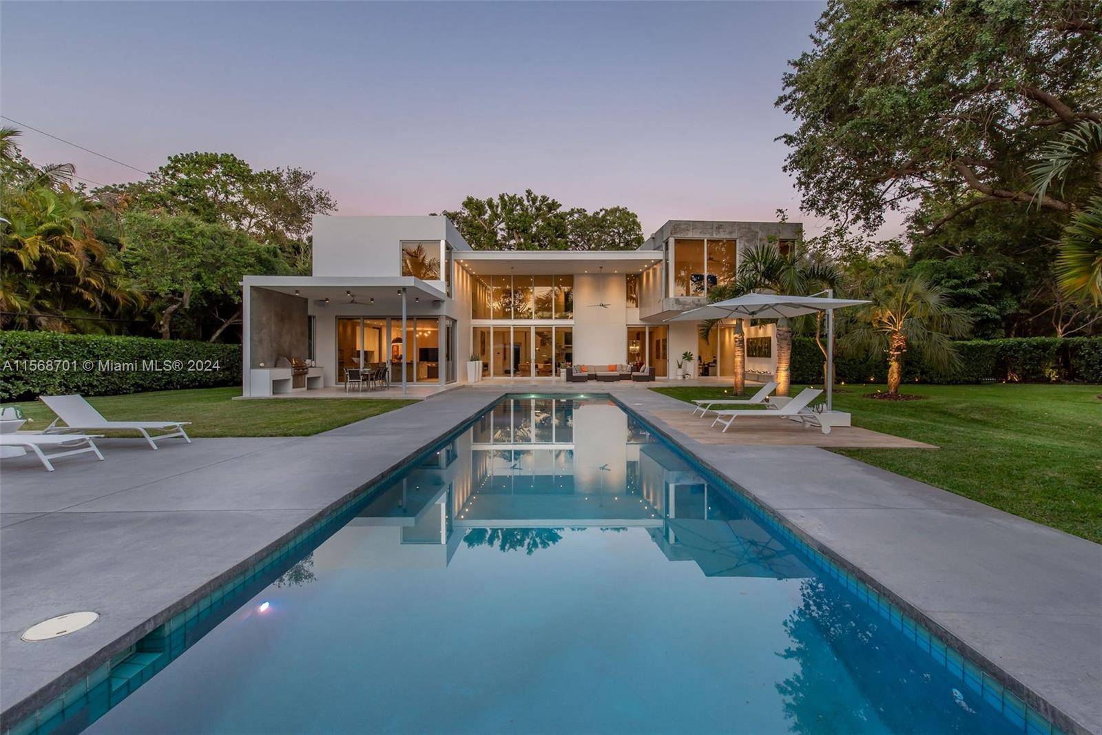 A contemporary masterpiece in the sought after neighborhood of Pinecrest.