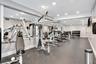 Fully equipped fitness center featuring cardio and strength-traininng equipment, offering everything you need to stay active without leaving home