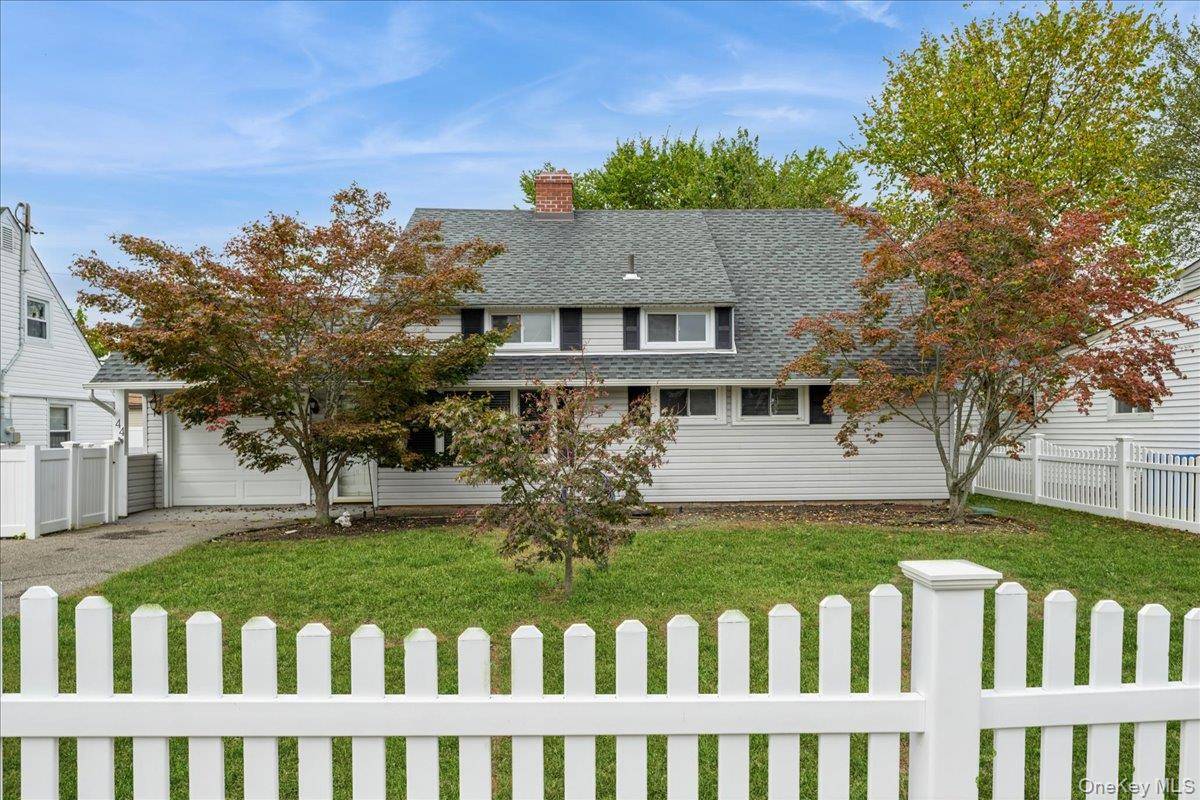Welcome to this spacious and beautifully expanded Levitt ranch, offering 7 versatile rooms and 4 5 bedrooms perfect for growing families or those seeking flexible living space.