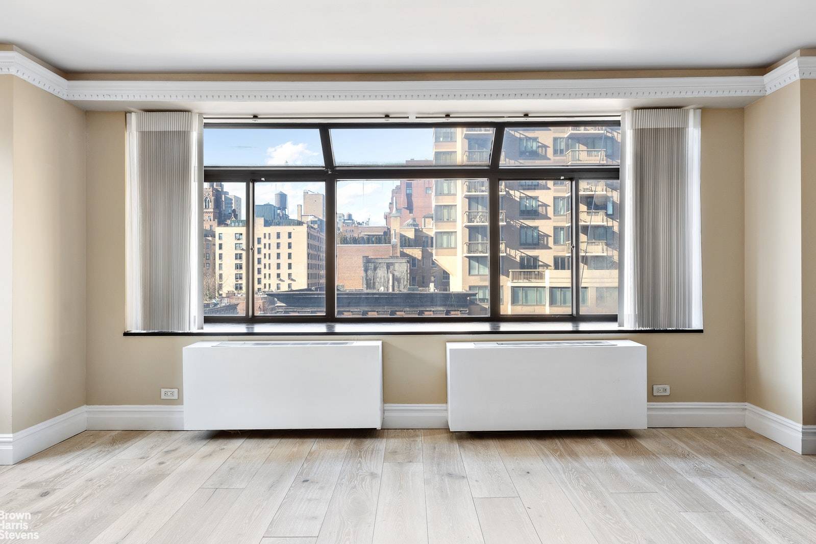 Residence 9A at Le Trianon is a sunny 2 bedroom, 2 bathroom home with an open floorplan with all of the luxury the Upper East Side has to offer.