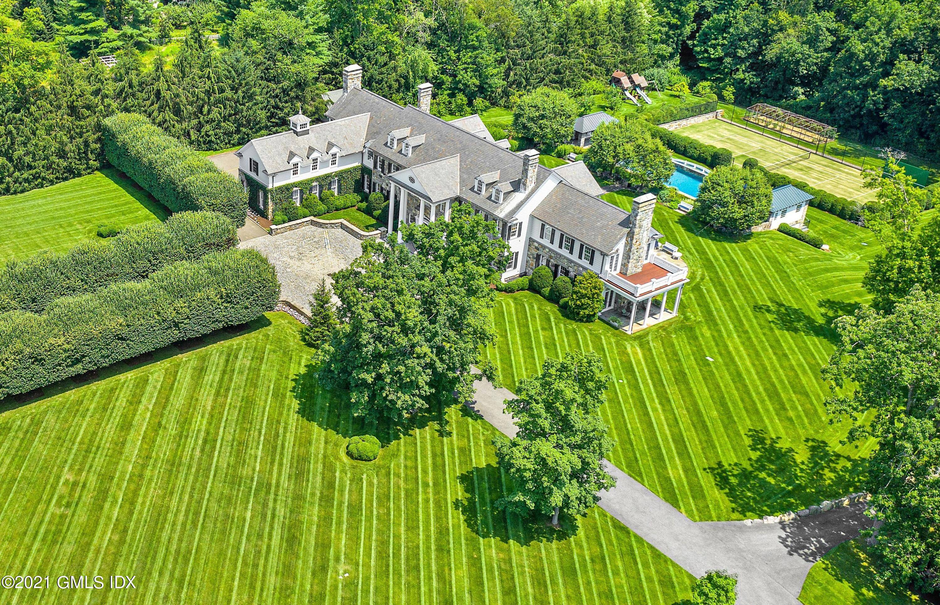 One of a kind offering on 8 acres presents this iconic STONEHILL compound in the coveted Greenwich countryside.