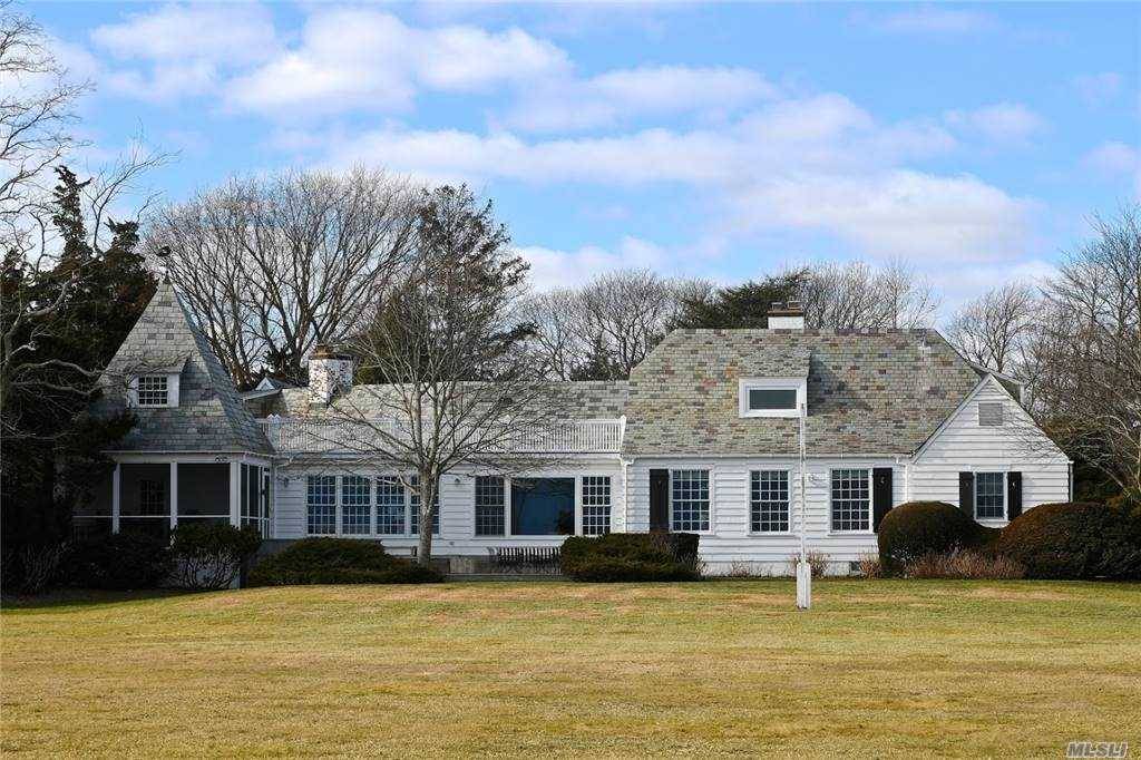Waterfront property with sweeping views of Bellport Bay cove.