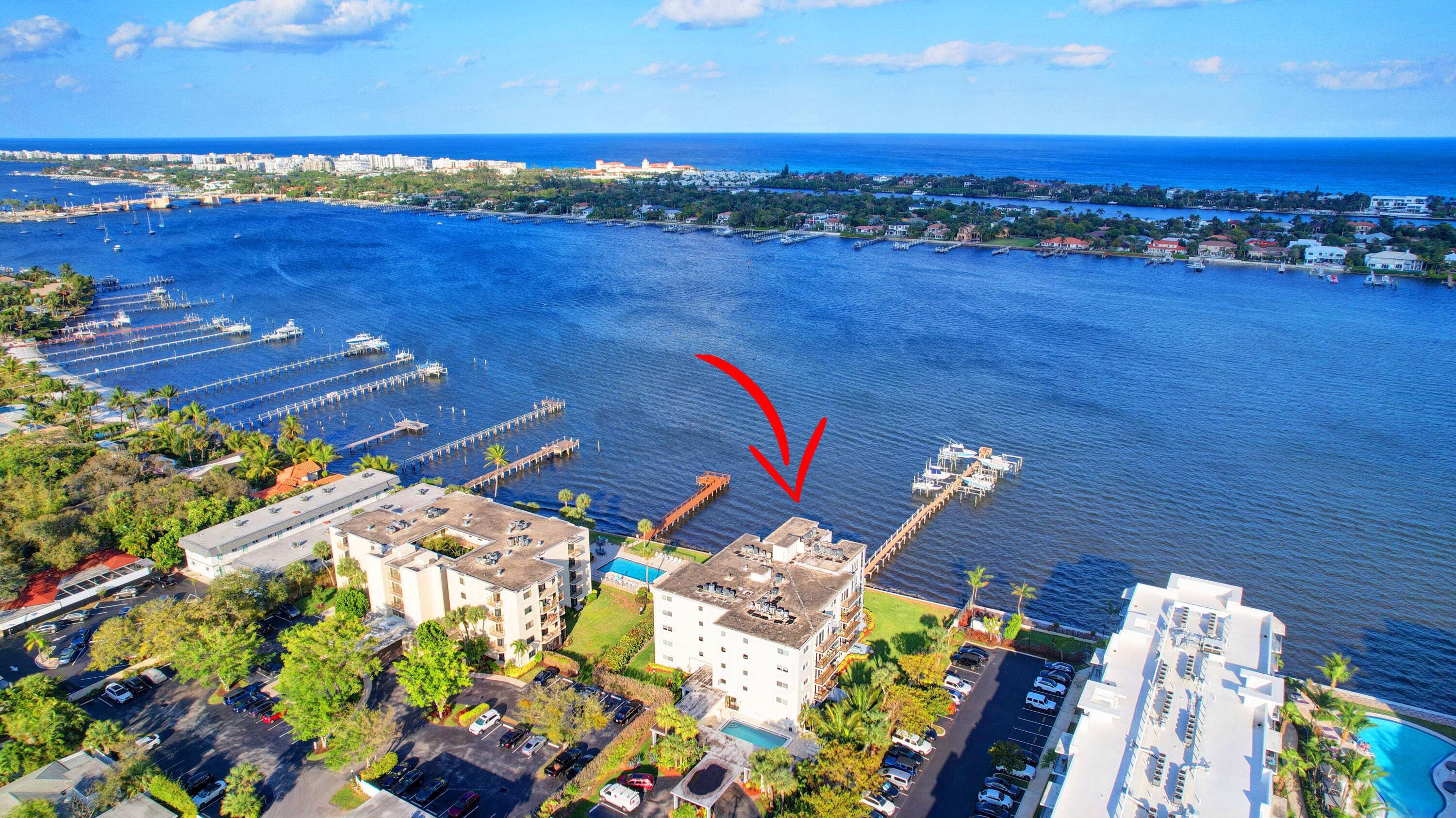 Experience the ultimate waterfront lifestyle in this spectacular BOATERS PARADISE condo complete with PRIVATE BOAT DOCK with easy access to ocean.