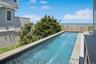 Outdoor pool featuring a water view