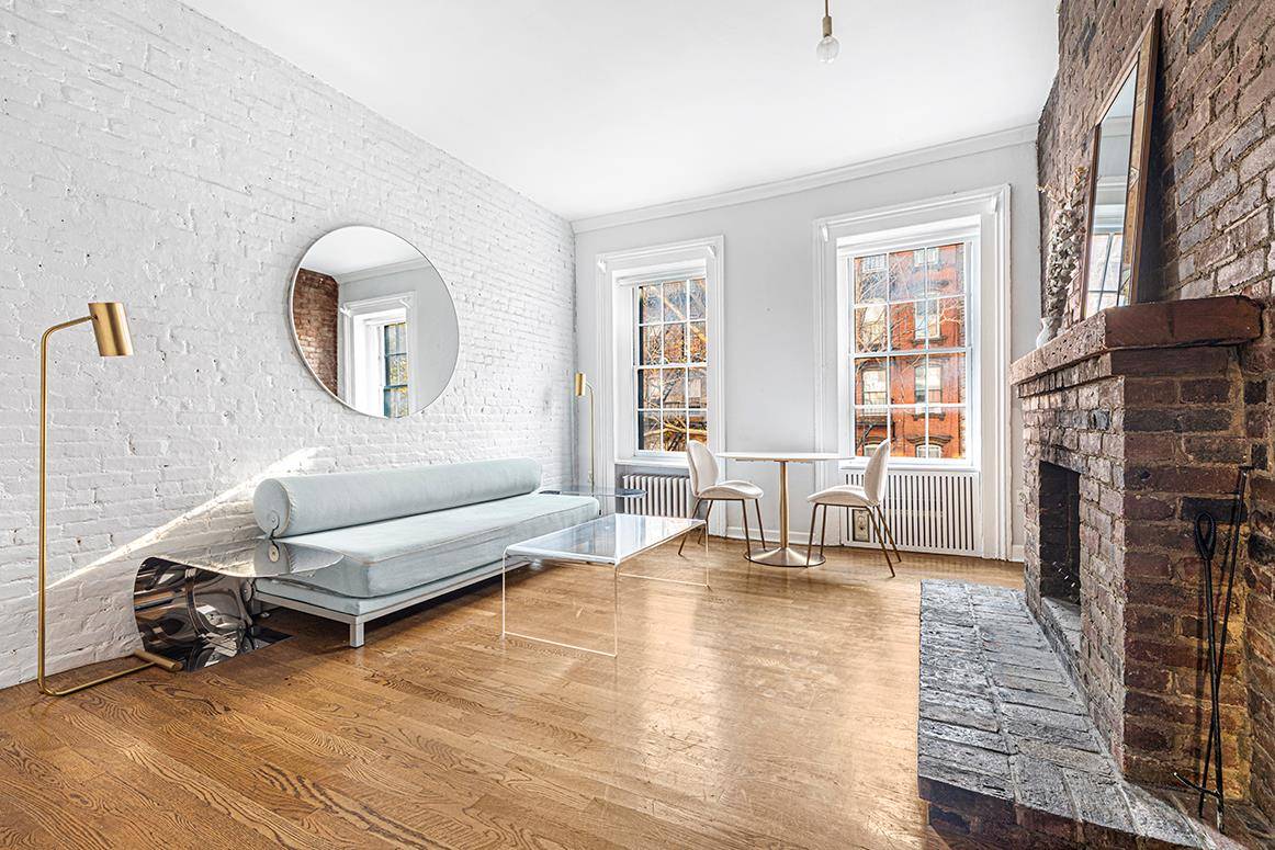 This East Village Townhouse Condominium is located in the heart of the vibrant East Village on the best residential treelined street.