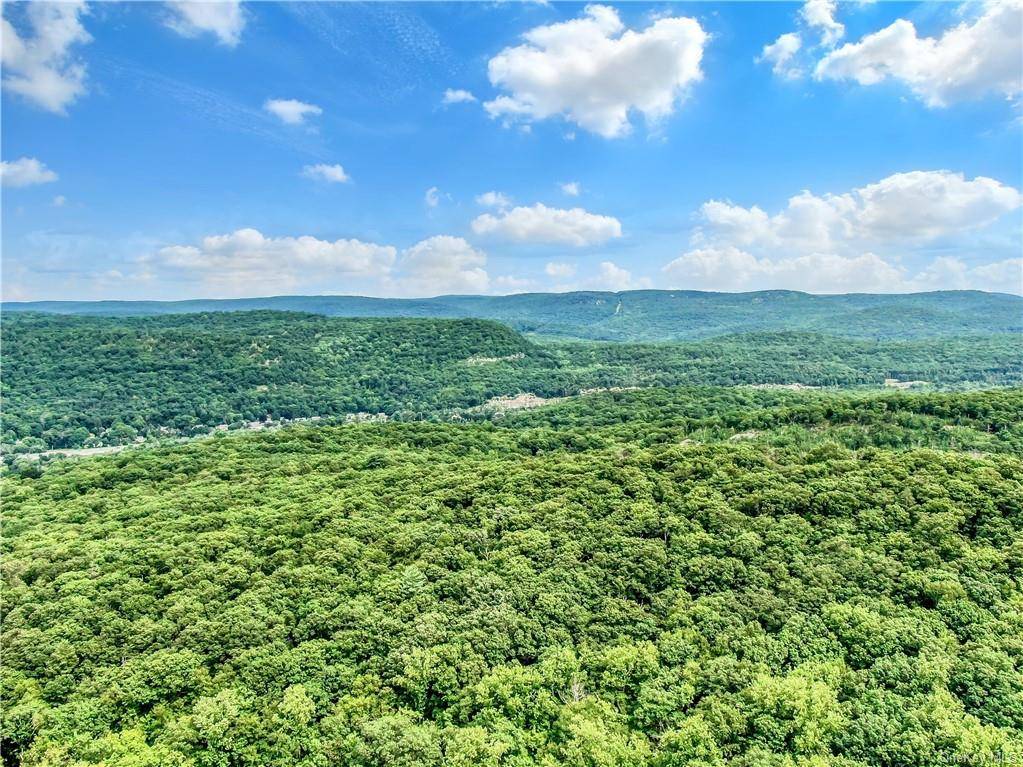 Absolutely breath taking 25 acre parcel of land, in the very private, prestigious Village of Tuxedo Park.