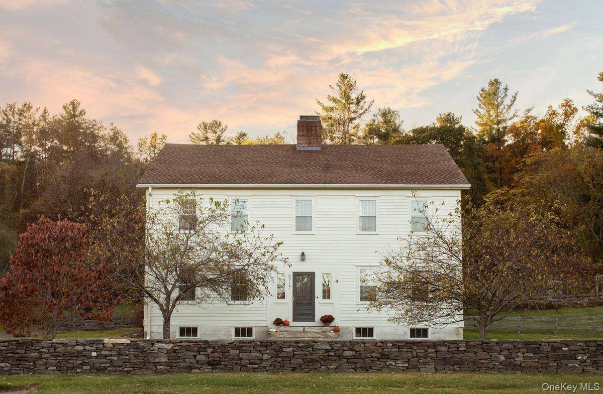 Said to be Hillsdale's second oldest home, this historic c1788 Shaker built center chimney Colonial sits on 17 acres of sprawling green hillside, gardens, and fruit trees.