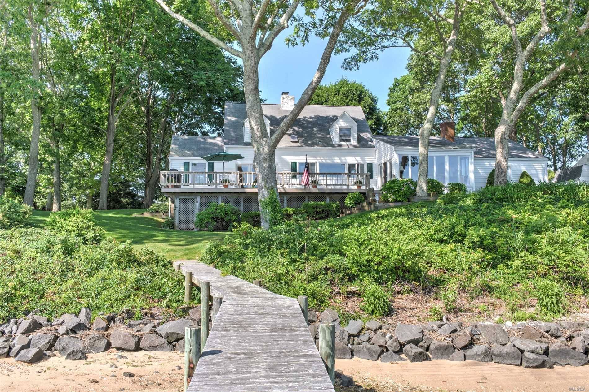 Cape Cod Waterfront located on one of Southold's most coveted streets, combines the best of elegance, style, amp ; craftsmanship.