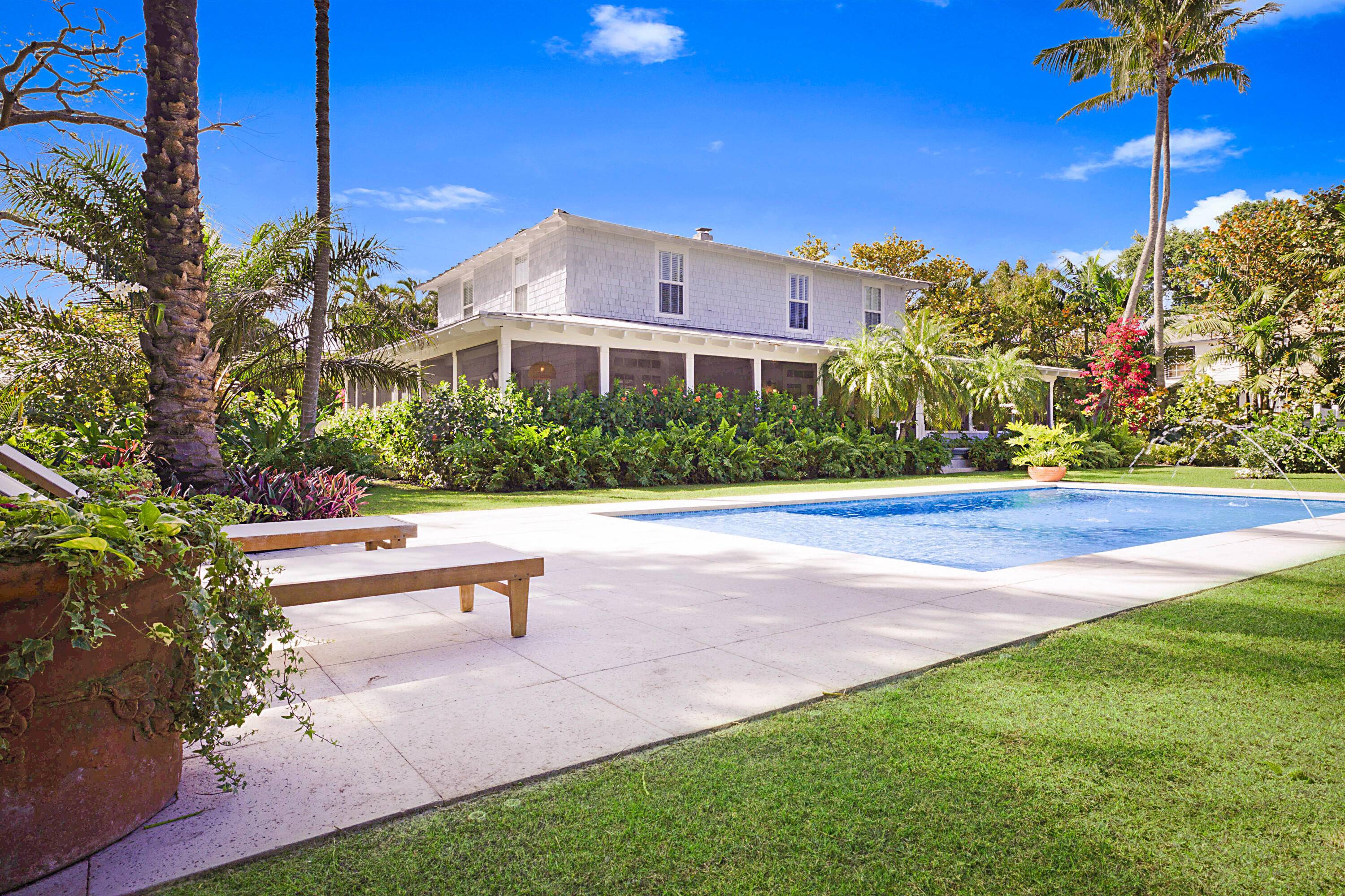 Welcome to 3402 Floral Ave, a stunning Montauk style 4bedroom 4bath home tucked away on a tranquil estate size lot a block from N Flagler in the coveted Northwood Shores ...