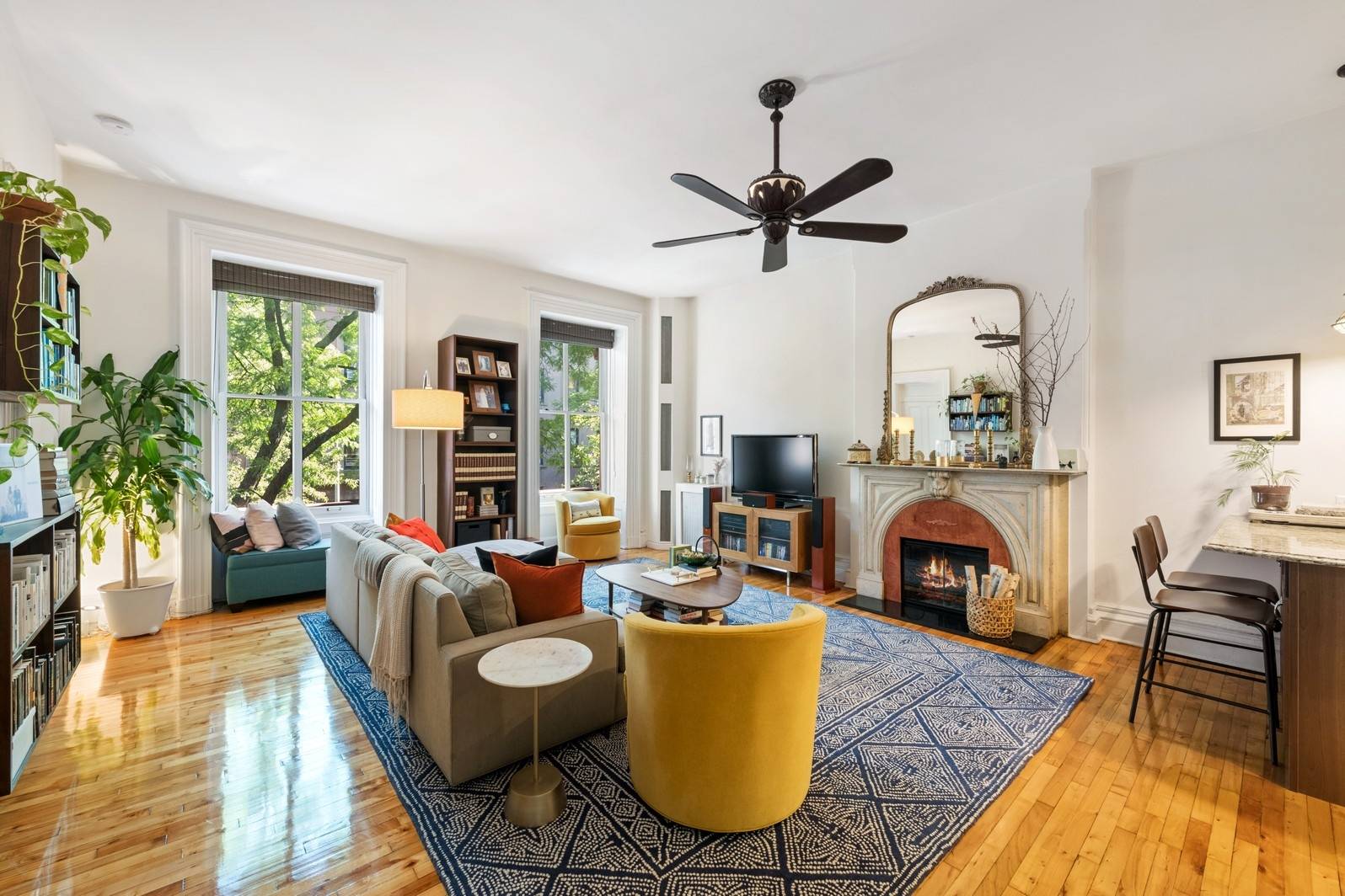 An expansive two convertible three bedroom full floor co op in a 31 foot wide brownstone on landmarked Remsen Street in Brooklyn Heights.