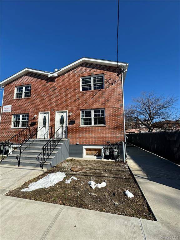 Step into this NEWLY CONSTRUCTED, semi attached 2 family house nestled in North Bronx.