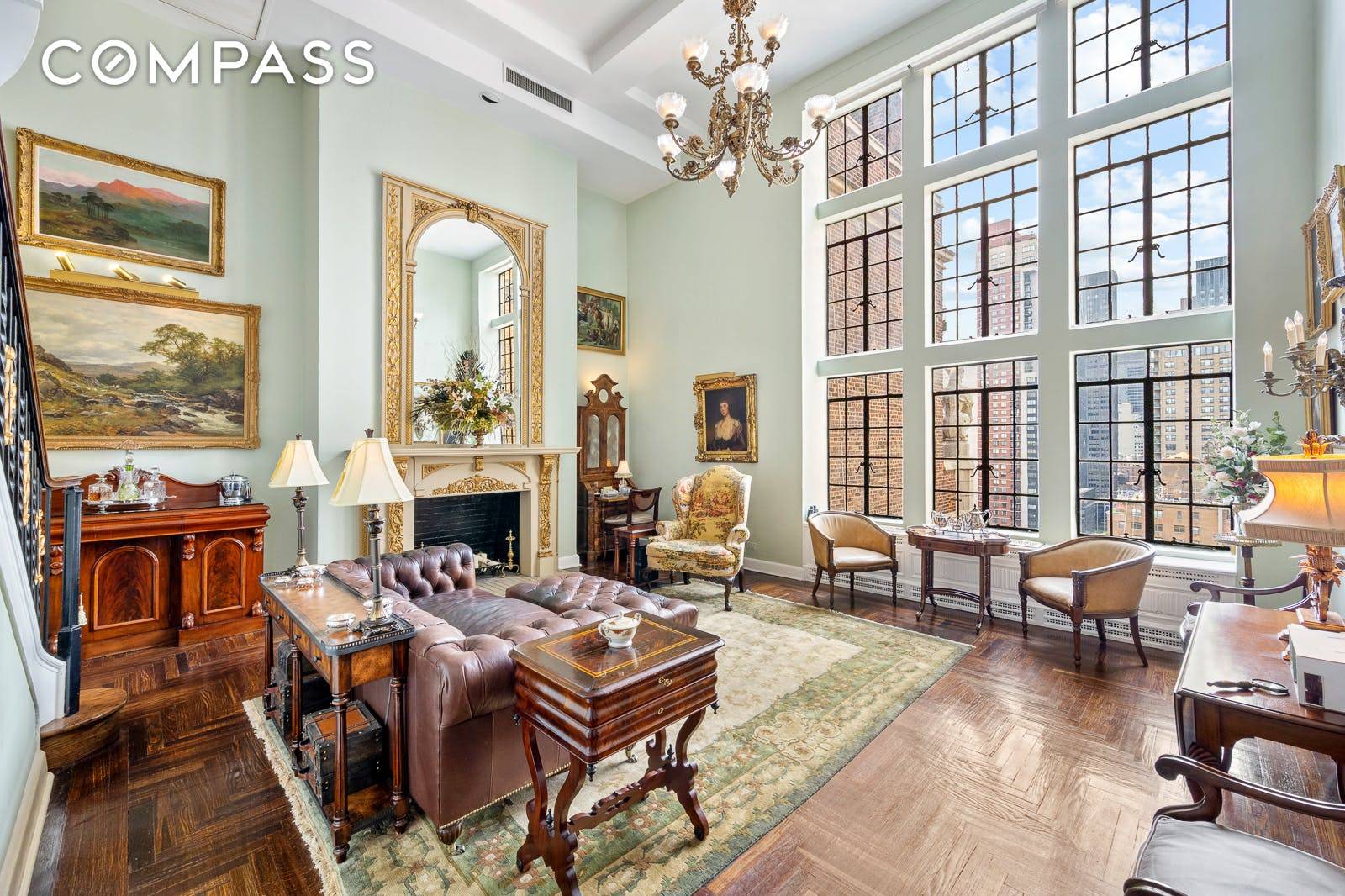 This one of a kind Tudor City penthouse features dramatic proportions with 18 foot ceilings clad with soaring 15 foot casement windows and coveted views of the Chrysler building.