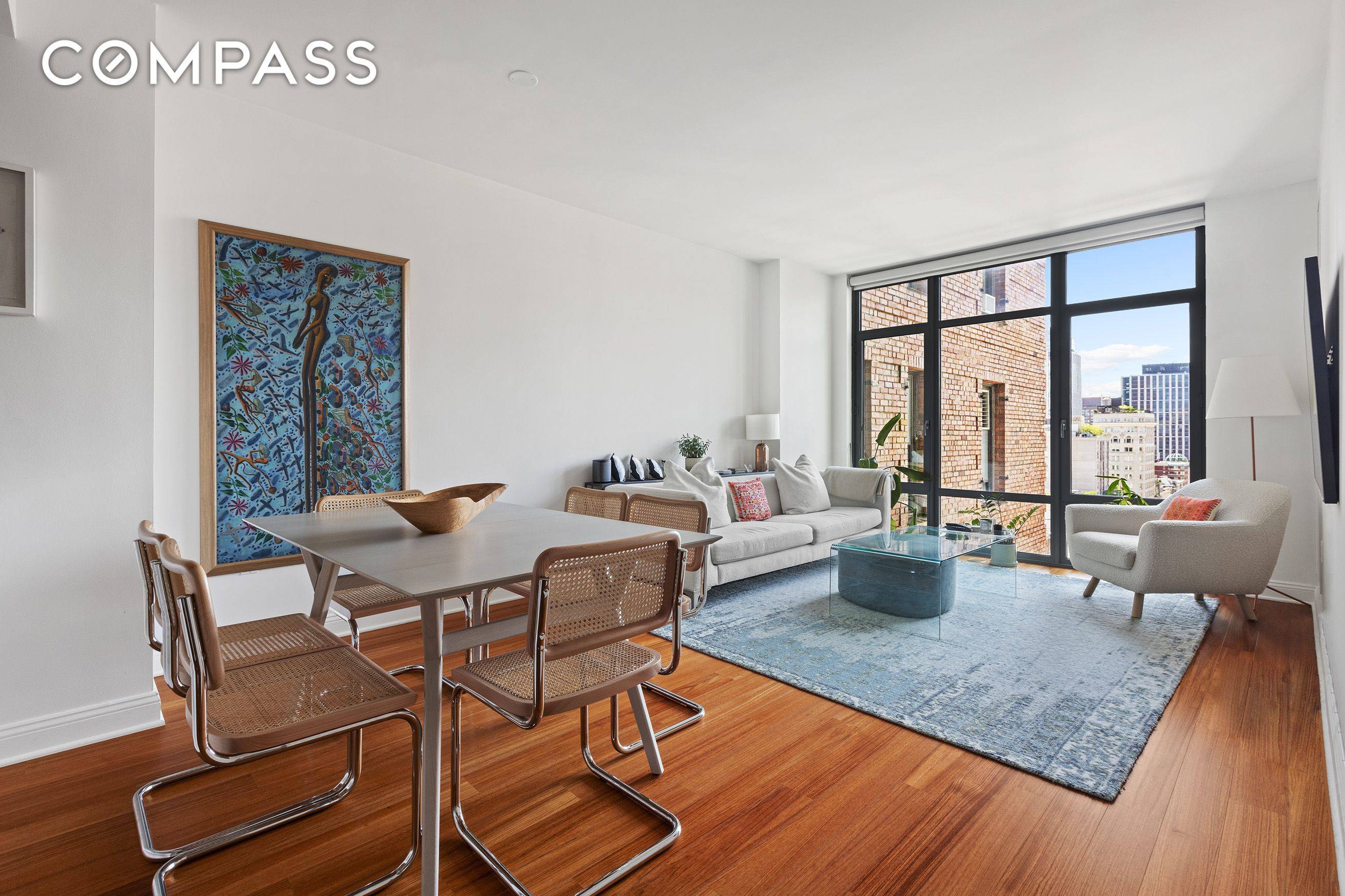 Modern Tribeca two bedroom, two bathroom condo with in unit washer dryer, high ceilings and views.