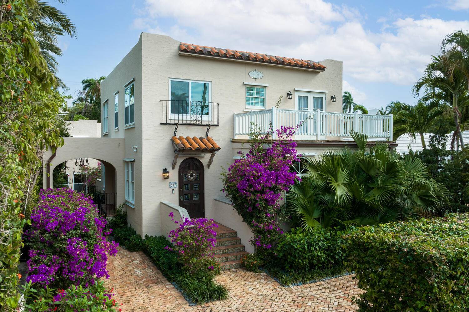 Exuding Mediterranean inspiration elegance and charm, this six bedroom in town home with separate two bedroom guest cottage creates a rare opportunity.