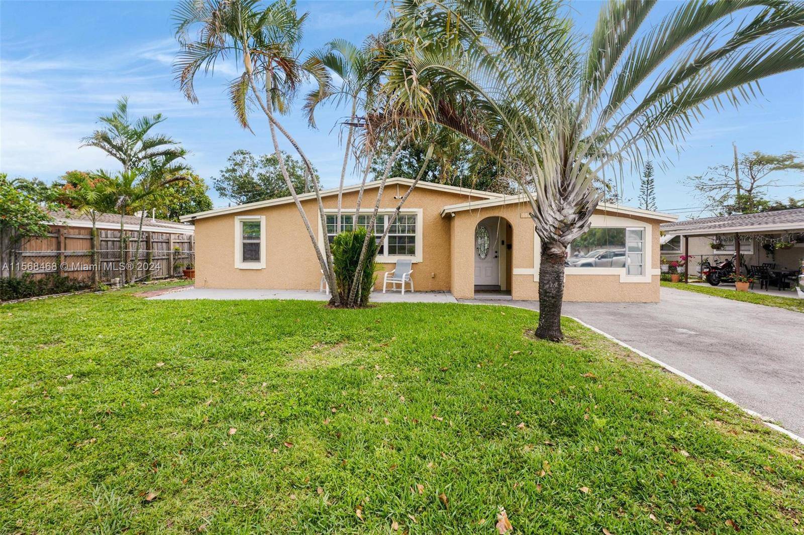 Family Oriented Community at North Andrews Gardens this 3 bedroom home features a convertible den for a 4th bedroom or carport garage, and a fully gated landscaped backyard with partial ...