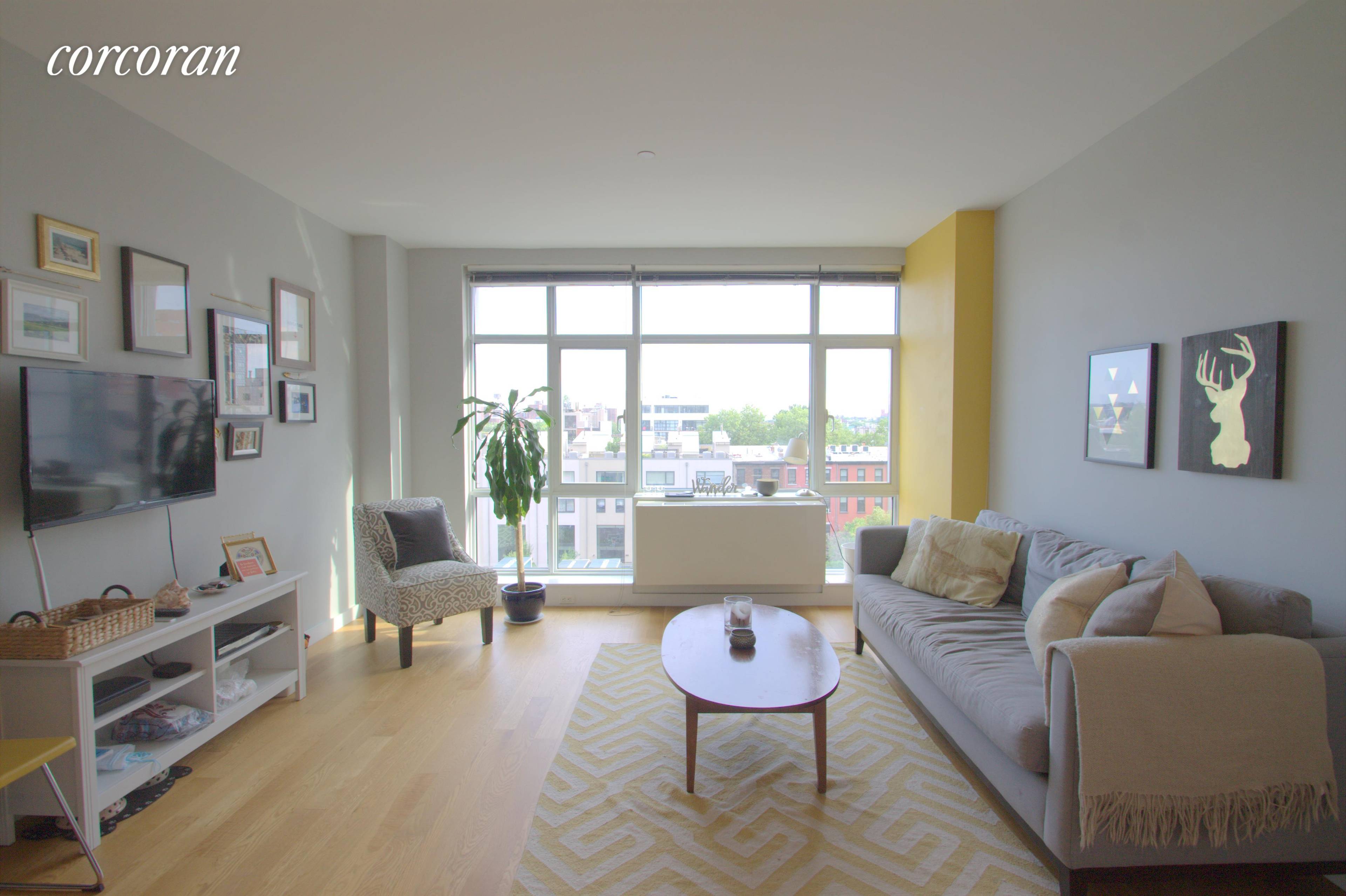 Sunny South Facing One Bedroom with Over Sized Windows letting in A TON of Natural Light !