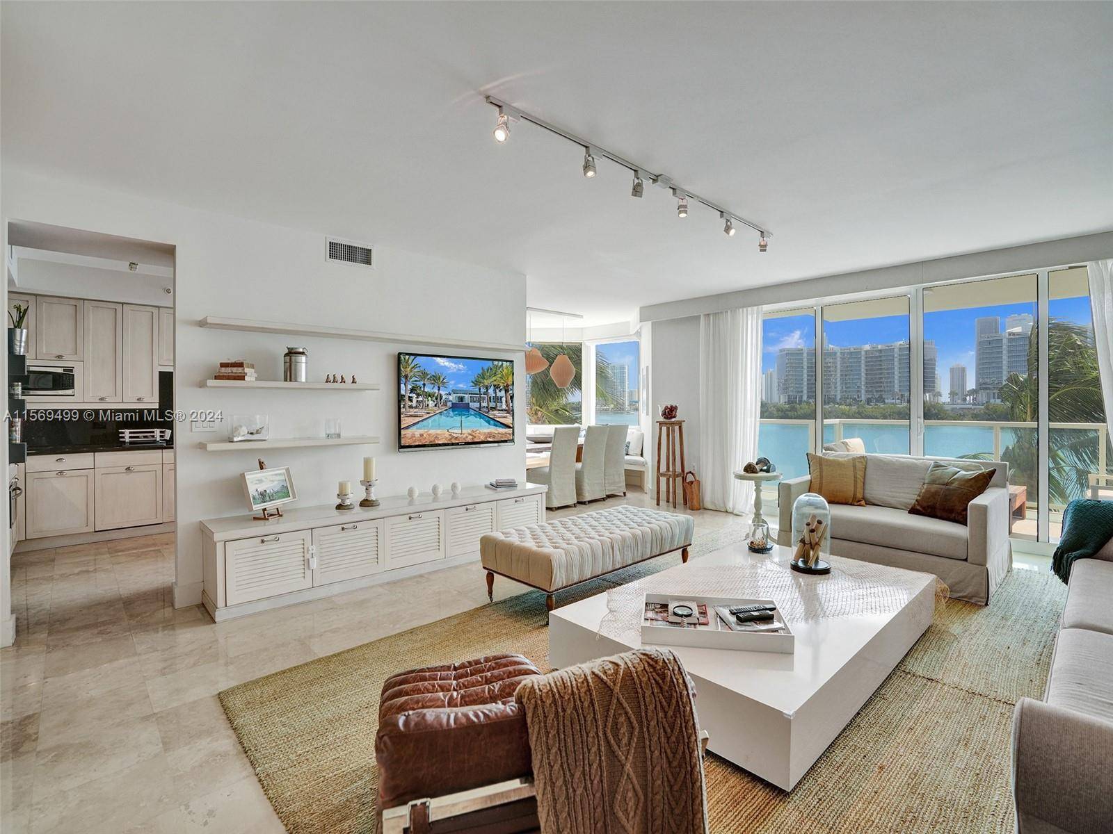 Step into this stunningly renovated and furnished apartment offering unparalleled views of the Intracoastal Waterway.