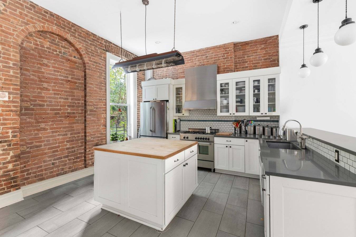 Experience spacious brownstone living at its best in historic Clinton Hill.