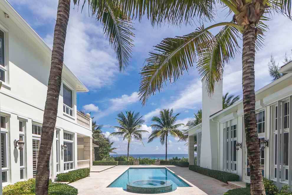 This oceanfront gated compound boasts 100 feet of prime, direct oceanfrontage in the Delray Beach Estate Section just south of Atlantic Ave.