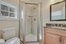 En-suite bath with shower