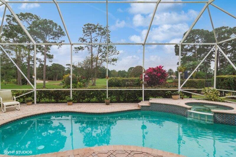 Built by Ecclestone, this 3 bedroom 3 bath pool home is in the desirable Cypress Point subdivision of PGA Village.